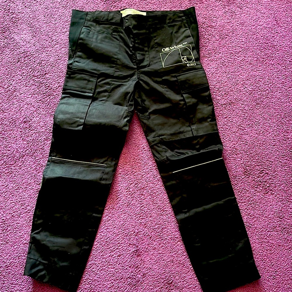 Off white pants; can un zip knee area to turn into shorts as well.